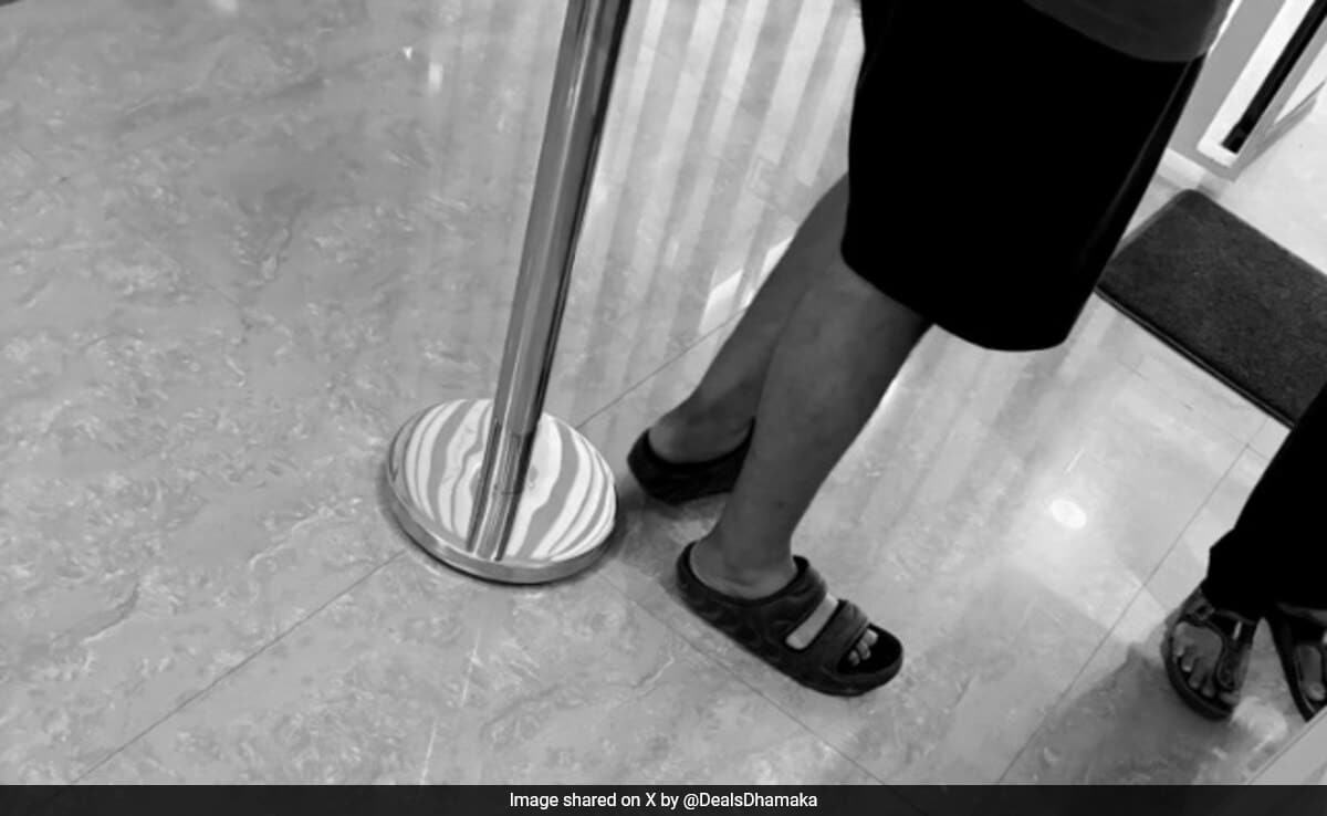 Passport Office Bouncer Turns Away Man in Unusual Attire