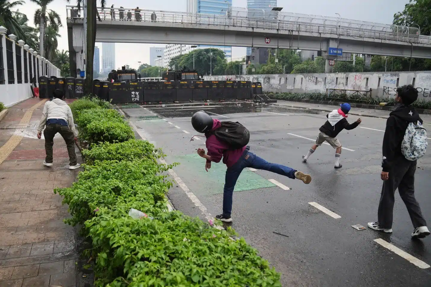 Women Take to the Streets with Brooms in Protest as Indonesian Leader Prabowo Heads to China
