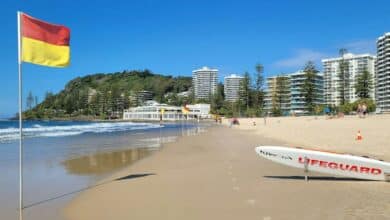 Australia’s red and yellow beach flags can be dangerously confusing. Is it time to change them?
