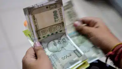 Rupee Hits Record Low of 92.05 Against Dollar Amid Oil Price Surge and Foreign Outflows