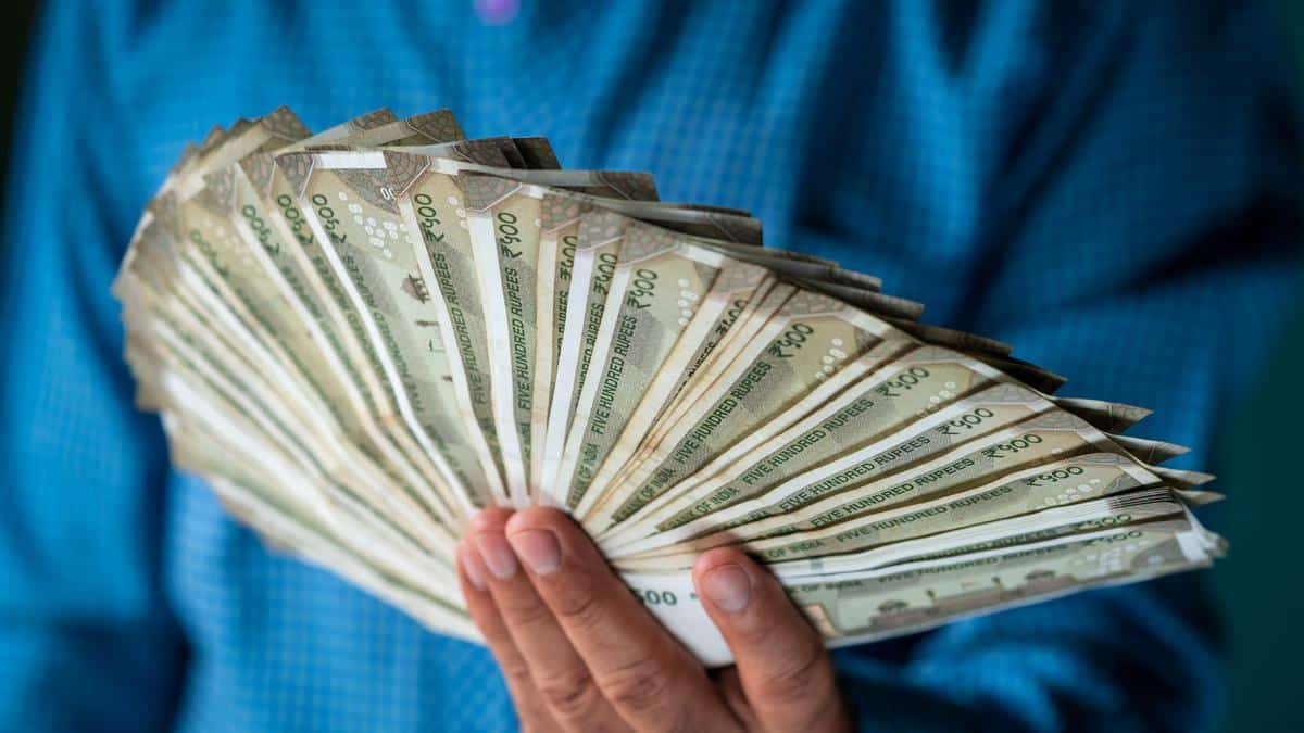 Rupee Declines 10 Paise Amid Strong Dollar and Geopolitical Concerns, Overlooking Positive Signals